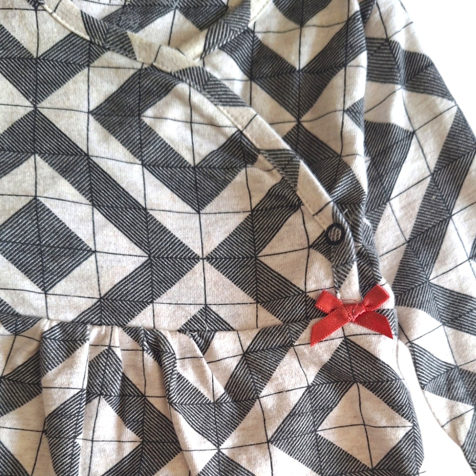 Jurk geometrisch patroon strik - 6/9M