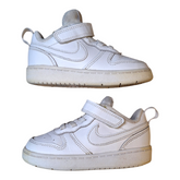 A pair of Nike Court Borough Low 2 sneakers, size 23.5. The shoes are all white with a lace-up and strap closure.