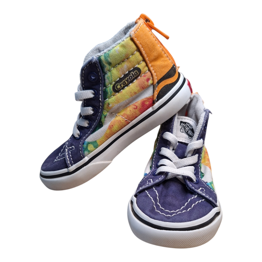 A pair of Vans Off The Wall limited edition Crayola SK8 Hi sneakers, size 23.5. The shoes feature a tie-dye pattern with crayon-inspired details. They have white laces, a zipper on the back, and a white rubber sole.